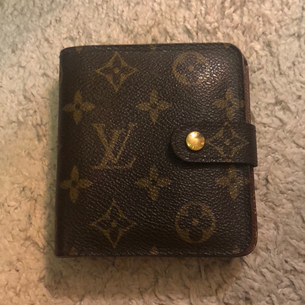 Louis Vuitton bifold wallet with change purse.